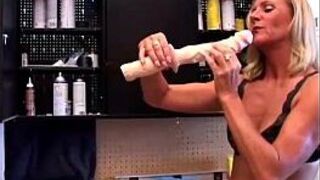 Sexy mature blonde in a tool belt - porn video